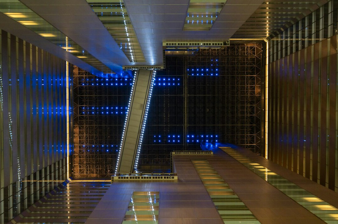 Server racks with glowing network equipment in a data room